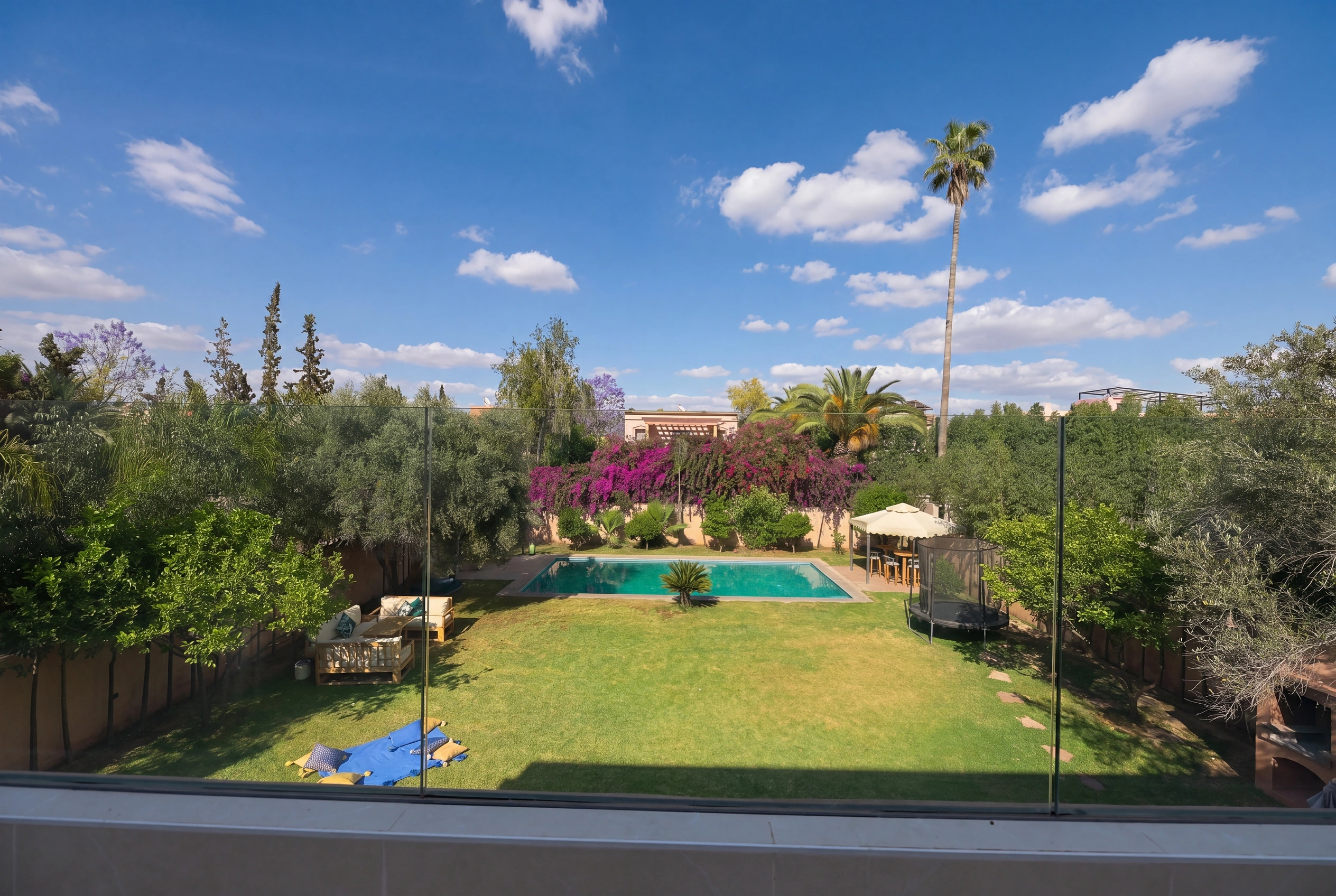 Villa Adam — Aerial view of private pool and lush garden, Marrakech