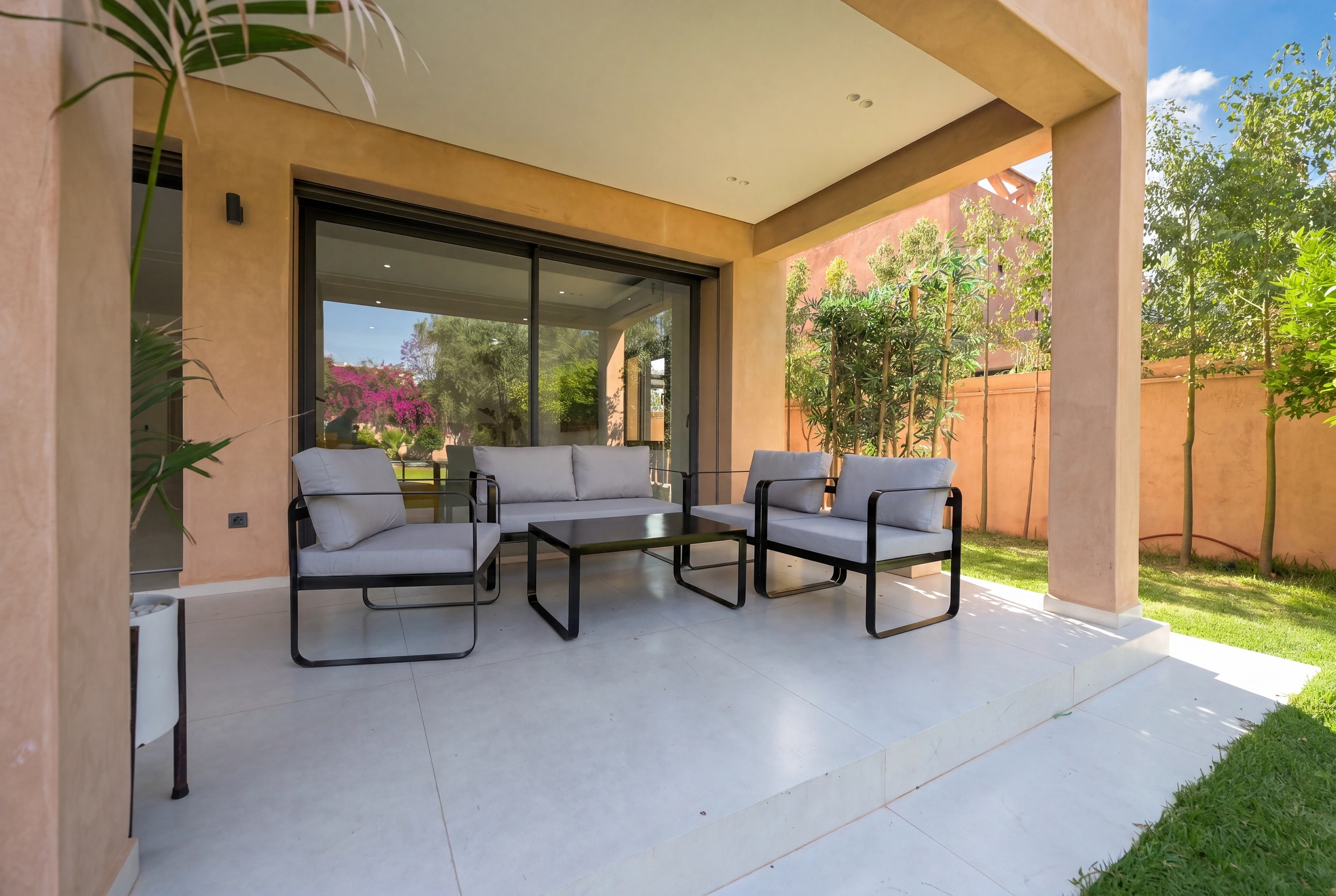 Villa Adam — Covered terrace with outdoor lounge seating